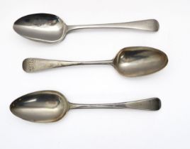 A George III silver Old English pattern tablespoon - Thomas Wallis I, London 1779; together with two