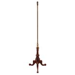 A gilt brass and turned walnut standard lamp - converted from a pole screen in the mid-20th century,