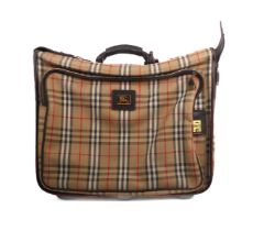 A vintage Burberry suit carrier case - 1980s, in classic check with dark brown leather trim and gold