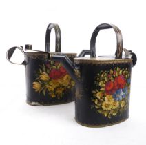 A well-matched graduated pair of Bargeware / toleware painted water cans - late 19th / early 20th