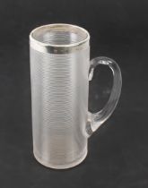 A tall and narrow late Victorian silver-mounted ribbed glass mug (14.2 cm high)