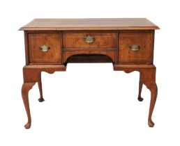 A George I style walnut lowboy or dressing table - probably early 20th century, using earlier