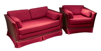 A Harrods mahogany bergere style showframe settee and matching armchair - the flared, angular frames