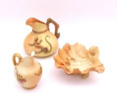 Three pieces of Royal Worcester blush ivory porcelain - comprising a shape 1714 jug with basket