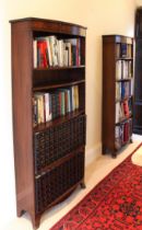 Two similar George III style inlaid mahogany and tulipwood banded bowfront open bookshelves - mid-