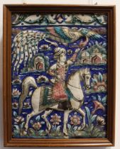 A set of four Persian Qajar moulded pottery faience glazed tiles - 19th century, each depicting a