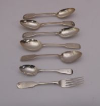 A set of three George IV silver dessert spoons - Andrew Wilkie, Edinburgh 1820, retailer's mark