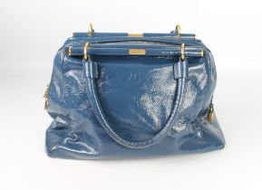 A blue patent leather shoulder bag by Yves Saint Laurent - with brushed gold toned hardware, two
