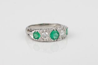 A fine quality 18ct white gold, emerald and diamond ring - Birmingham hallmarks, with three