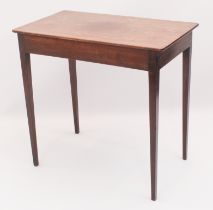 An early 19th century mahogany centre table - the rectangular top raised on slender square,