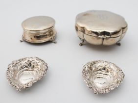 Two silver trinket boxes - one by E. S. Barnsley & Co., Birmingham 1912, of eight lobed form, raised