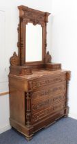 A French walnut and marble dressing chest with mirror - late 19th century, the tall mirrored back