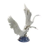 A large and impressive Lladro group titled 'Swans Take Flight' - c.1992, sculpted by Salvador Debón,