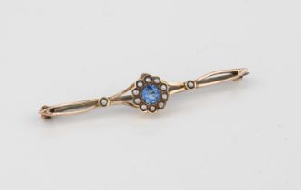 A Victorian 9ct gold, topaz and seed pearl bar-brooch - stamped '9ct', with a central round cut