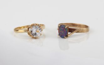 Two 9ct gold stone set rings - comprising an opal triplet ring with twist setting, marked '9CT',