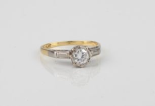 A mid-century 18ct yellow gold, platinum and diamond single stone ring - the approx. 0.42ct