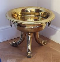 A 19th century brass urn-form wine cooler - the circular, cupped bowl with everted rim, central