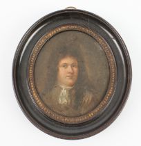 An oil on copper portrait miniature of a bewigged gentleman, late 17th or 18th century, 7.5 x 6.5