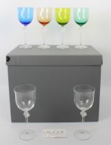 A set of six Lalique Roxane coloured wine glasses - comprising four differently coloured and two