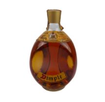 A bottle of vintage Dimple Old Blended Scotch Whisky - by John Haig & Co. Ltd., probably 1970s,
