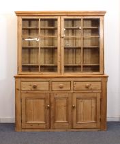 A Victorian and later waxed pine glazed dresser - the moulded cornice over a pair of four-pane