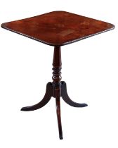 A late-Regency mahogany tilt-top tripod table - the square top on a turned column to three hipped