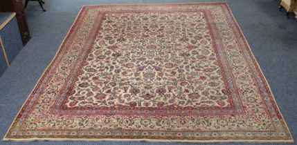A large, good quality Kashan style hand knotted wool rug - probably mid-20th century, the central