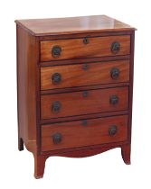 A late 19th century mahogany chest of drawers - of small proportions, in the George IV style, the