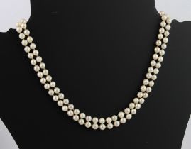 A double row cultured pearl necklace with 9ct gold and pearl clasp - London hallmarks, 43.5 cm