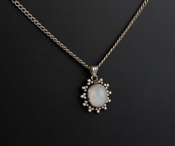 A silver and moonstone pendant necklace - stamped '925', the approx. 10.5 x 8.5mm oval cabochon