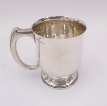 A George VI silver pint tankard - Harrods Ltd., Birmingham 1936, ovoid form with slightly everted