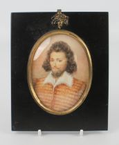 A late 19th century portrait miniature of a bearded gentleman in early 17th century costume, Sir
