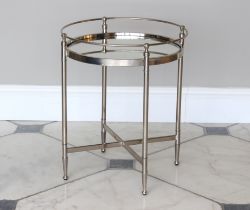 A chrome and mirrored drinks table - modern, the circular mirrored top with raised gallery, raised