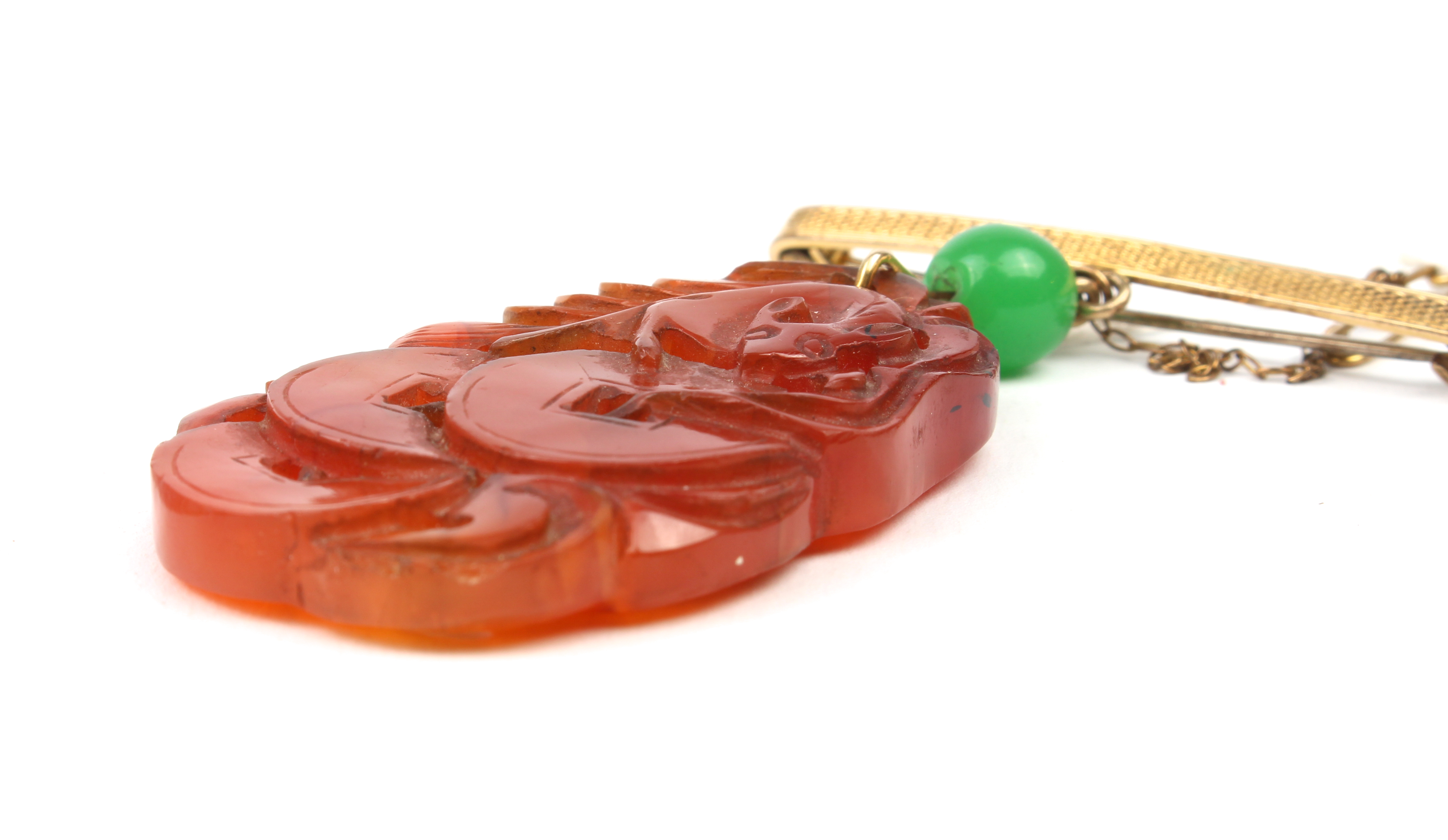 A mid-century Chinese carved jade plaque on bar brooch - the ovoid, russet jade plaque pierced and - Image 6 of 13