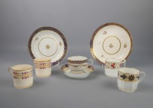 An English porcelain cup and saucer (possibly Worcester), four 19th century coffee cans and two