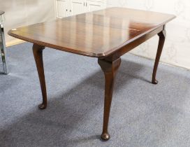 A Georgian style mahogany extending dining table - mid-20th century, of modest proportions, the