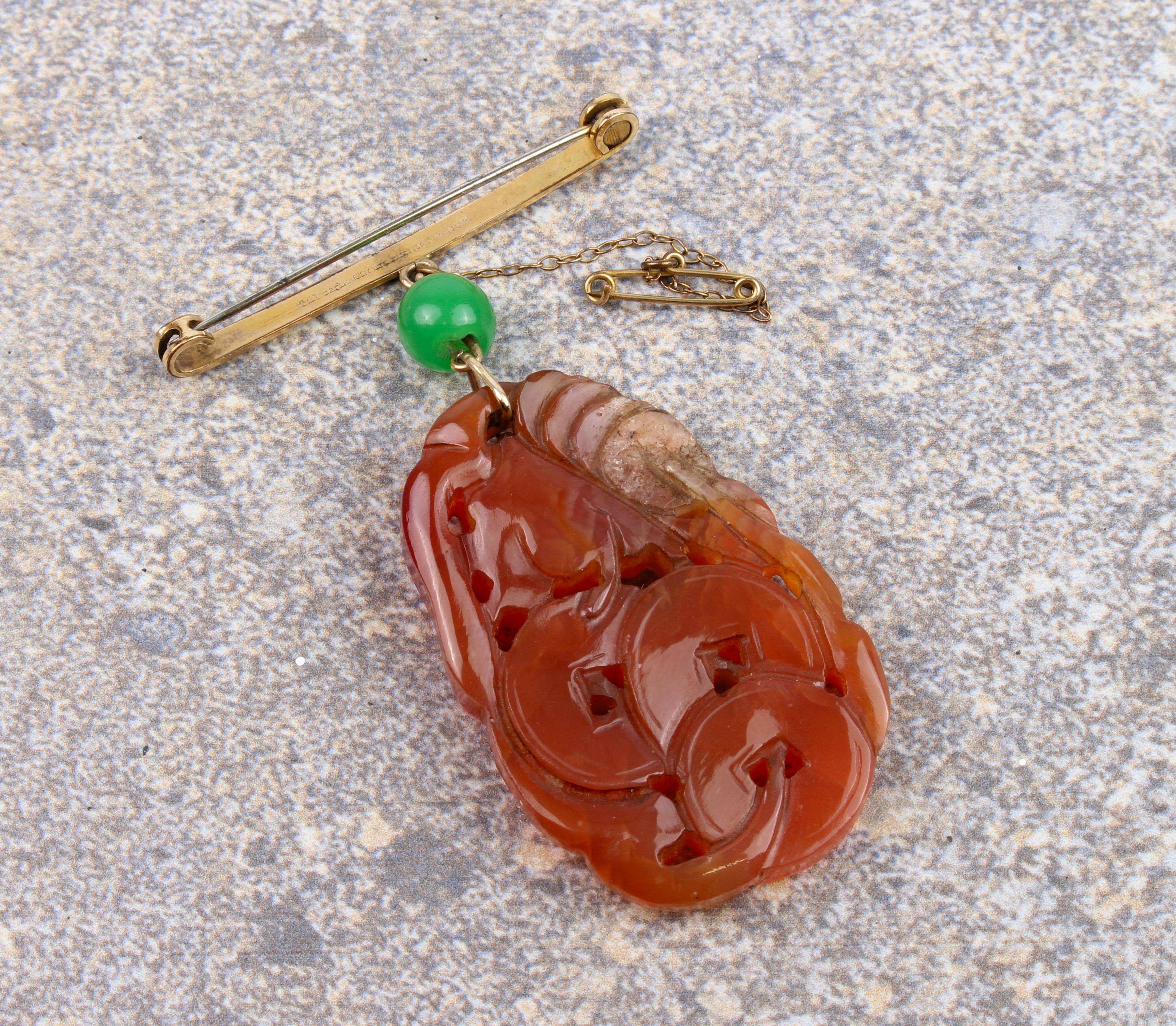 A mid-century Chinese carved jade plaque on bar brooch - the ovoid, russet jade plaque pierced and - Image 4 of 13
