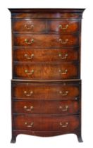 A mid-19th century mahogany bowfront chest on chest - the moulded, dentil cornice over two short and