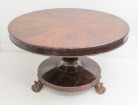 A William IV radially veneered rosewood tilt-top breakfast table - the circular top with plain