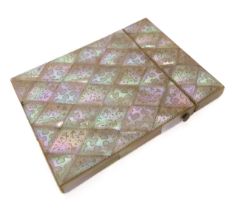 A 19th century mother of pearl card case - the rectangular, diamond veneered case with engraved with