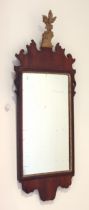 A Victorian fret framed and parcel gilt mirror in the George II style - the rectangular plate within