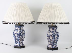 A pair of Oriental blue and white porcelain vase lamps - of hexagonal baluster form, decorated
