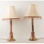 A pair of rouge marble and brass table lamps - modern, of column form, ivory silk shades with beaded