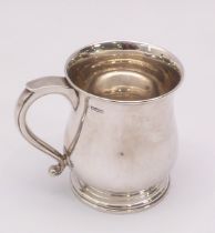 A George VI silver pint tankard - Thomas Bradbury & Sons Limited, Sheffield 1936, baluster form with