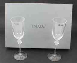 A set of six Lalique Roxane crystal champagne flutes - the round funnel-shaped bowls with basal