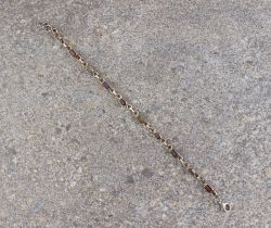 A silver and multi-gem semi-precious stone bracelet - stamped '925', set with alternate oval and