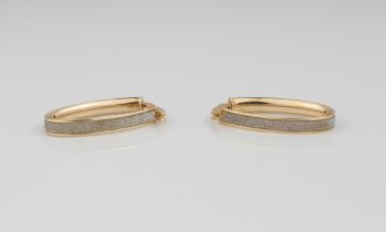 A pair of 9ct gold hoop earrings - with hinged post backs for pierced ears, 28mm long. (boxed)