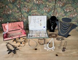 A large collection of vintage and retro costume jewellery - including some silver pieces.