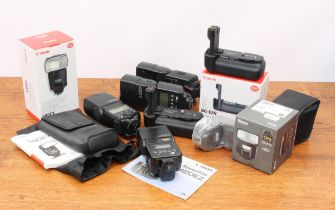 A group of Canon DSLR accessories - including two items in original boxes - a 580EX Speedlite and