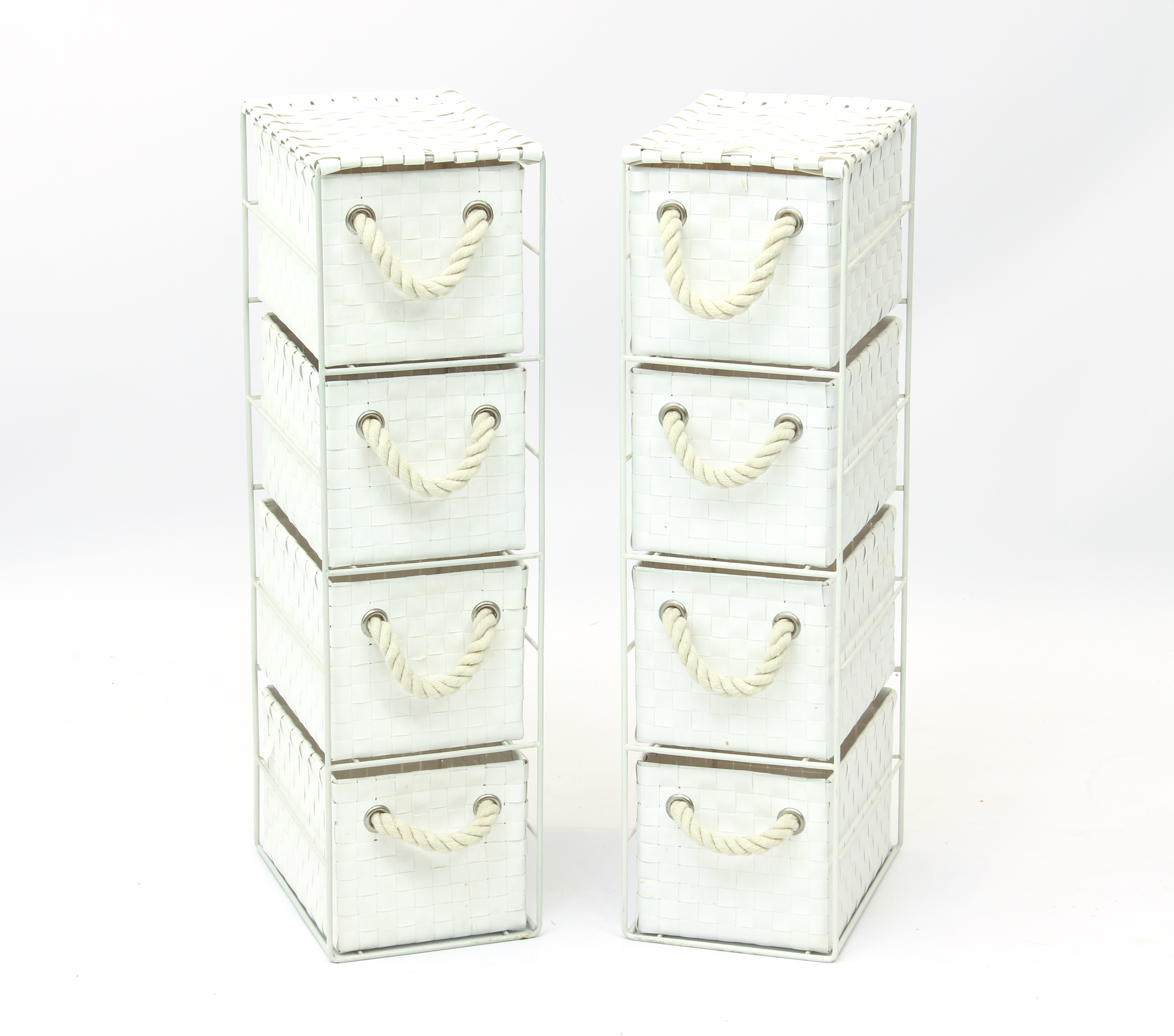 A pair of small white rattan style four drawer units - woven white plastic with rope handles, wire